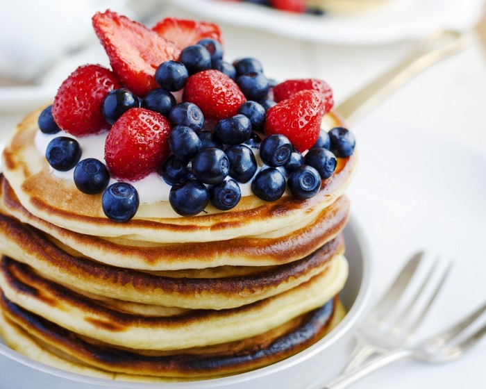 Stack of Pancakes with Strawberries and Blueberries