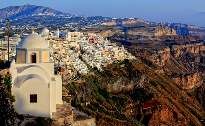 Imerovigli, Greece with white houses and cliffside