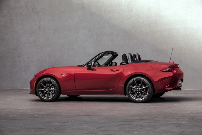 Red Mazda MX-5 Miata convertible parked