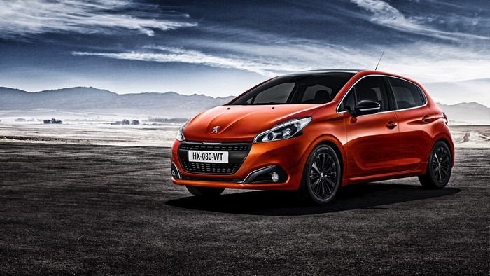 Orange Peugeot 208 5-door car