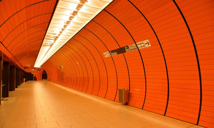 Munich U-Bahn station with orange tiled tunnel