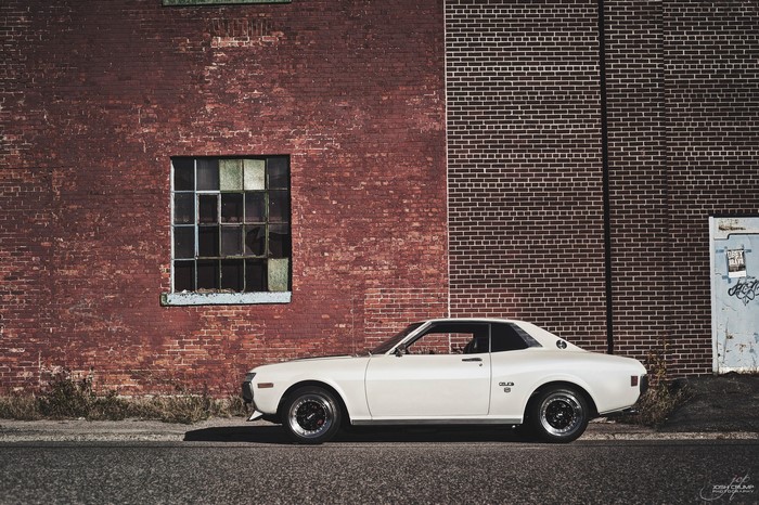 1974 Toyota Celica GT parked by brick building