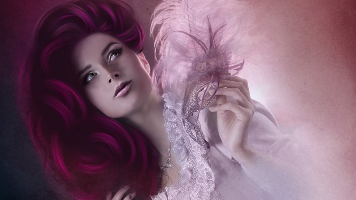 Woman with purple hair holding a masquerade mask