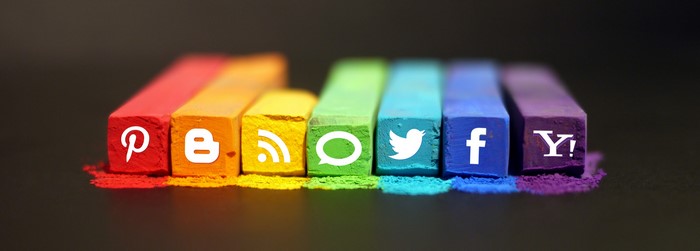 Social Media Logos on Rainbow Colored Chalk Sticks
