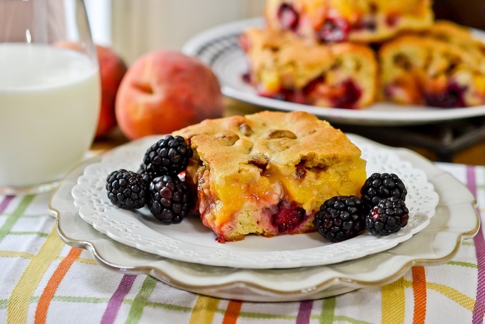 Peach and Blackberry Cobbler Slice with Blackberries and Milk