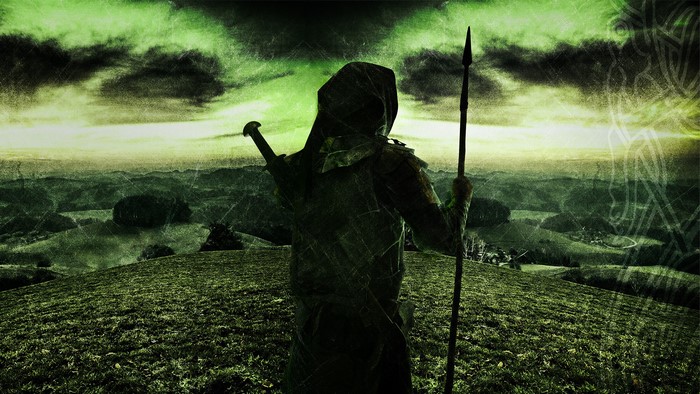 Figure with hood and spear on a hill