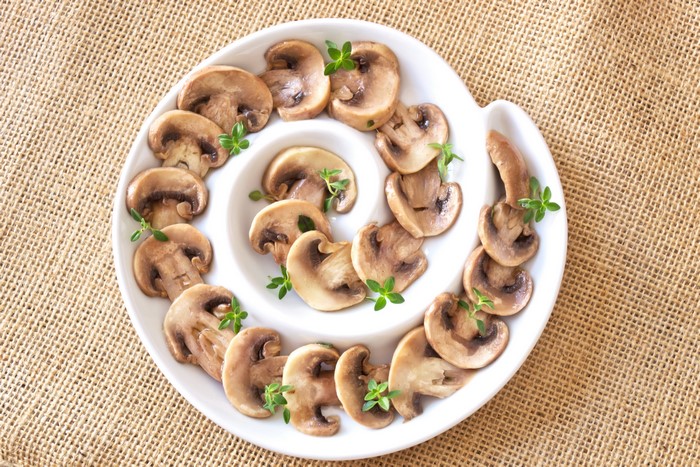 Sliced Mushrooms on a Swirl Plate