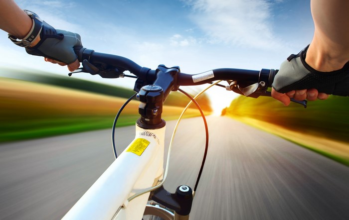 Riding a bicycle on a road