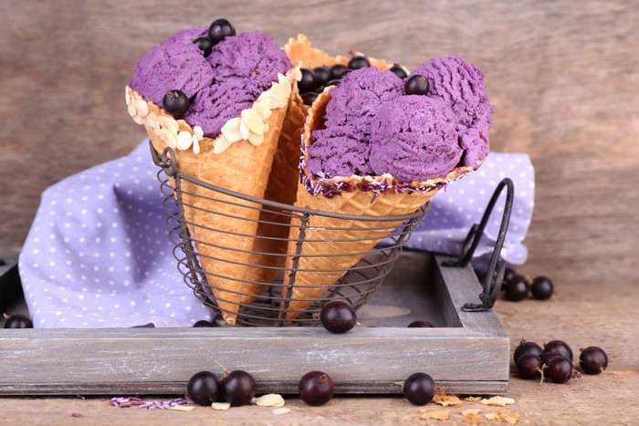 Purple ice cream cones with currants