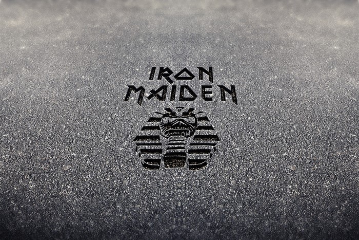 Iron Maiden logo with Eddie on a textured background