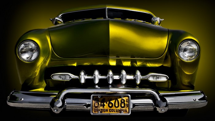 Front view of a vintage gold 1949 Mercury car