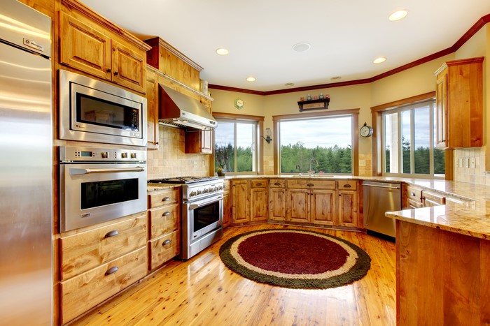 Kitchen with wooden cabinets and granite countertops