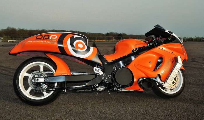 Orange Suzuki motorcycle with custom fairings
