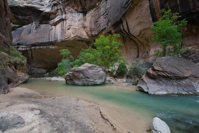 River flowing through a narrow canyon with large rocks