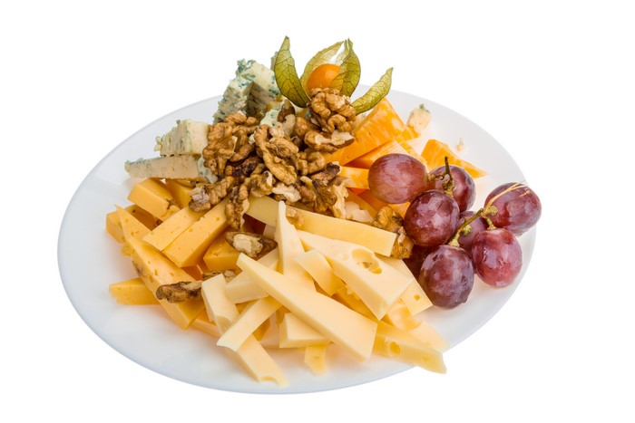 Cheese, Nuts, and Grapes on a Plate