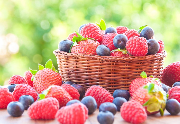 Strawberries, Raspberries, and Blueberries in a Wicker Basket