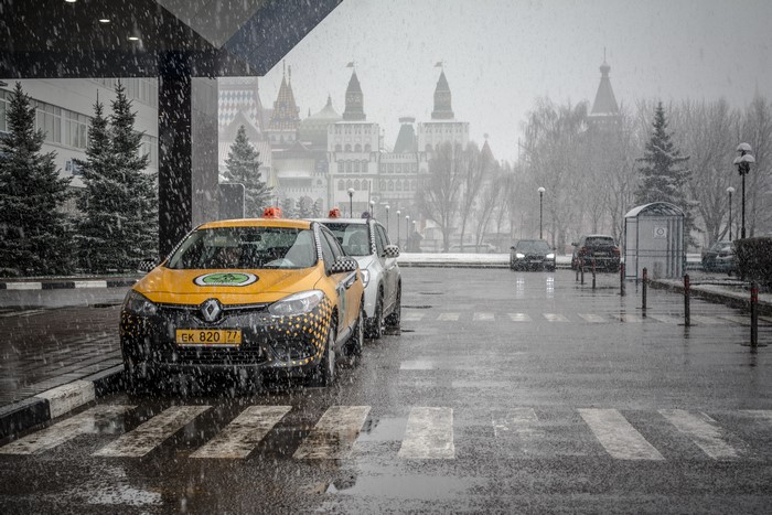 Yellow taxis in Moscow, Russia during rain