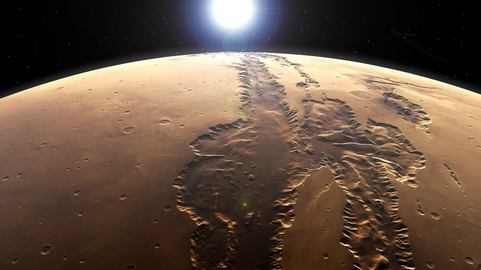 Mars Valles Marineris from space with sun