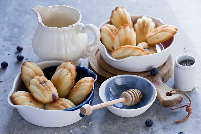 Madeleines with blueberries and a pitcher
