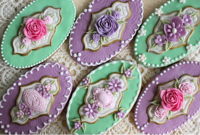 Decorated oval cookies with floral icing
