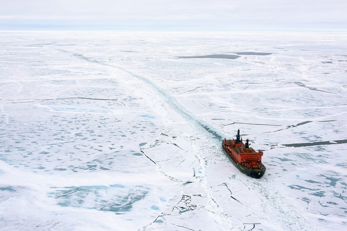 Icebreaker ship breaking ice in the Arctic