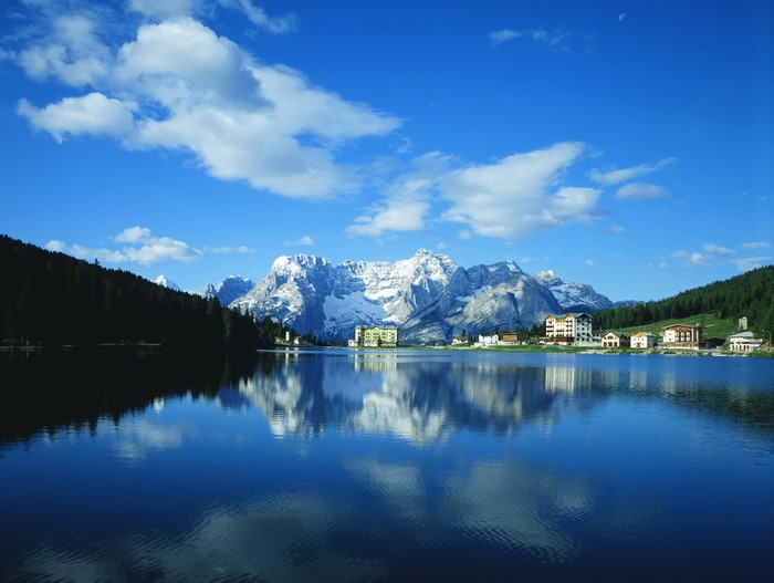 Lake with Mountains and Buildings