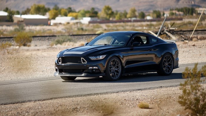 Black 2015 Ford Mustang RTR Spec 2 on a road