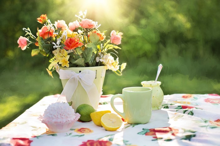 Still-life with flowers, lemons, and mug