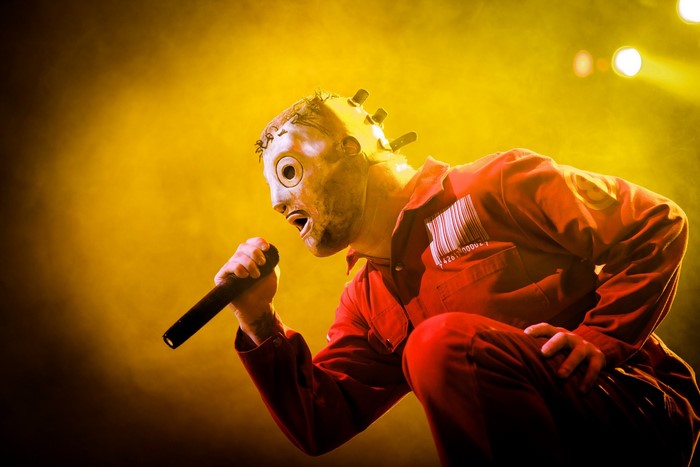 Corey Taylor from Slipknot performing with a microphone