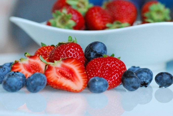 Strawberries and blueberries in a bowl
