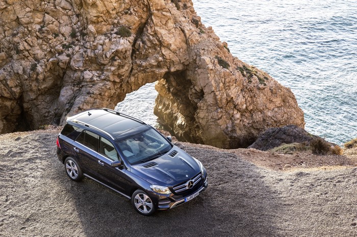 Blue 2015 Mercedes-Benz GLE 250 near rock arch