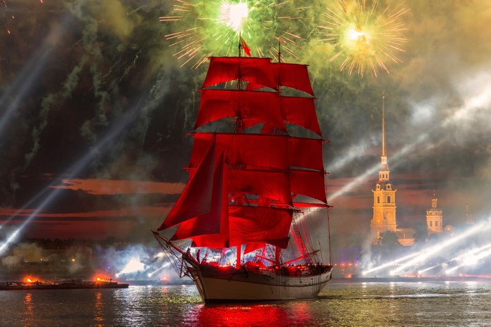 Ship with red sails and fireworks over St. Petersburg