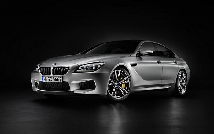 Silver BMW M6 Gran Coupe with license plate M GC 6667