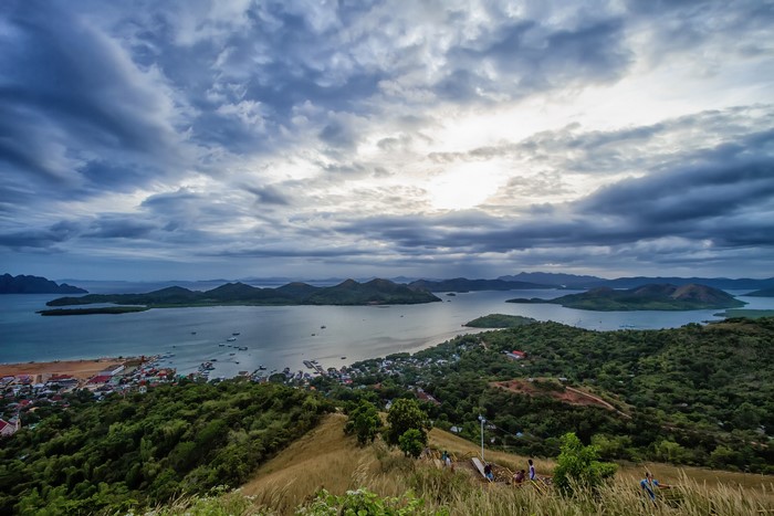 View of islands and coastline from a grassy hill