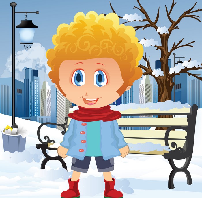 Boy in winter park with city background