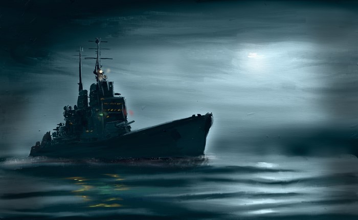 HMS Vanguard sailing at night