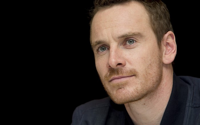 Michael Fassbender looking to the side