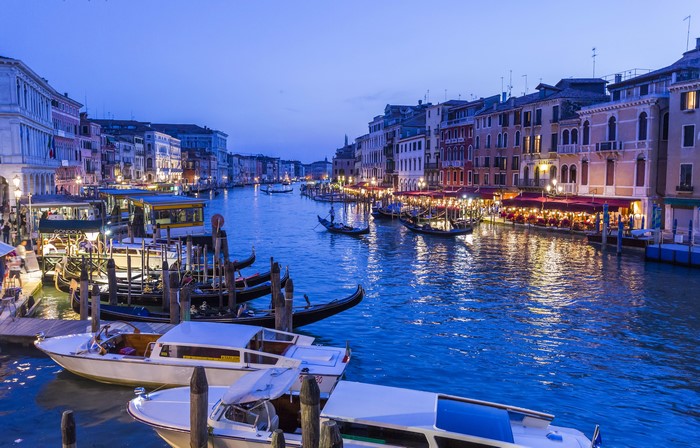 Venice Canal with Gondolas and Boats at Dusk