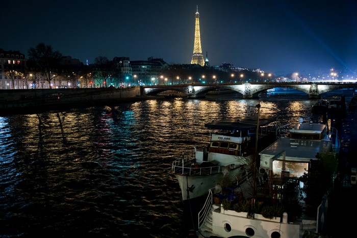 Paris at Night: Eiffel Tower, Seine River, and Boats