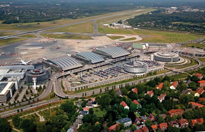 Hamburg Airport from above with surrounding houses and roads