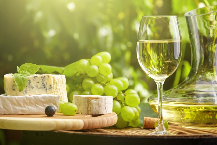 White Wine, Grapes, and Cheese Platter