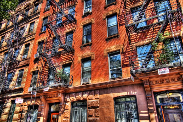 Brick Apartment Buildings with Fire Escapes in USA