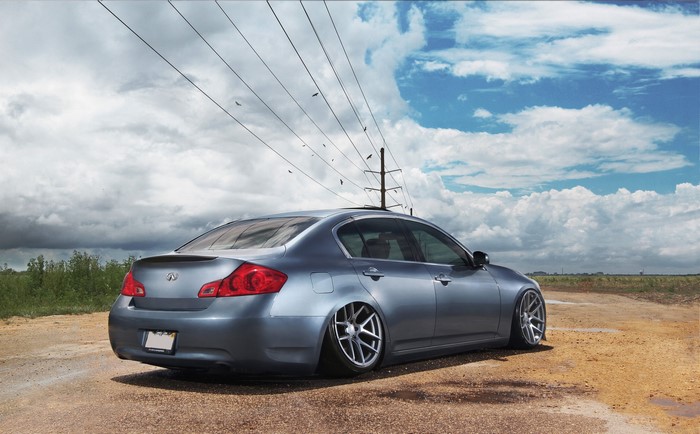 Infiniti G35 stance with clouds in the background