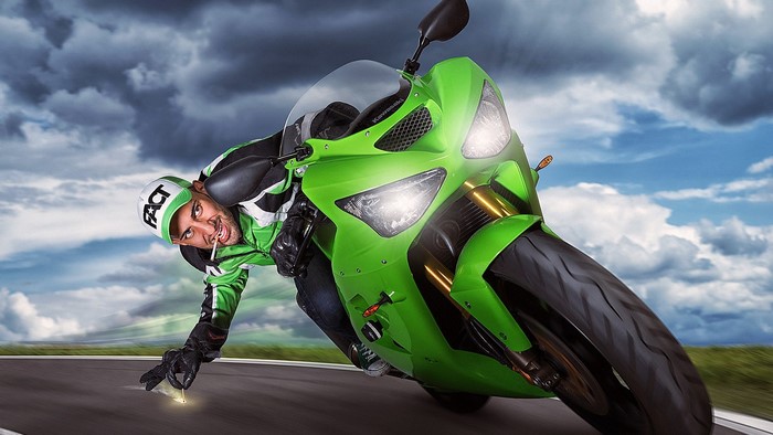 Man on Kawasaki Sportbike picking up object