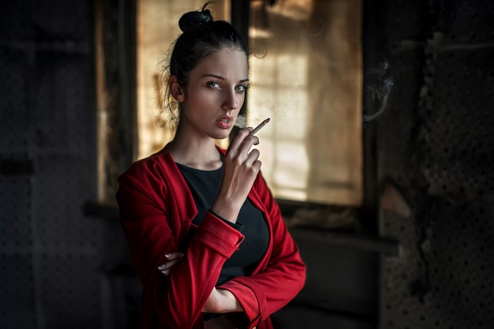 Alla Berger smoking a cigarette