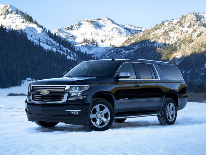 Black Chevrolet Suburban in Snowy Mountains