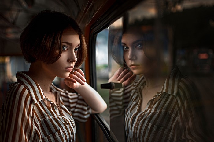 Woman looking out a window