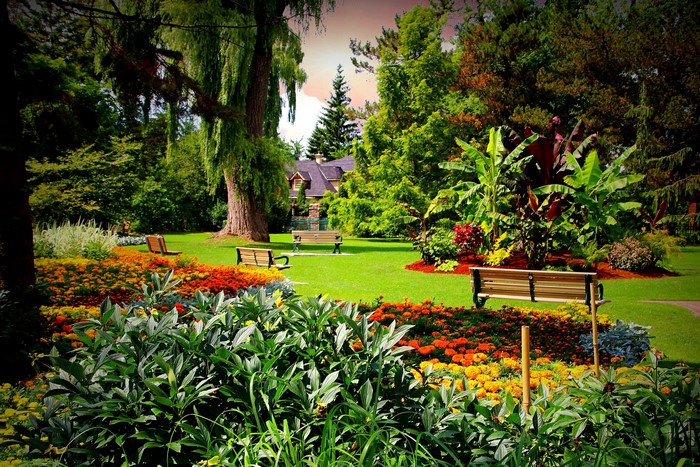 Edwards Gardens Toronto with colorful flower beds and benches