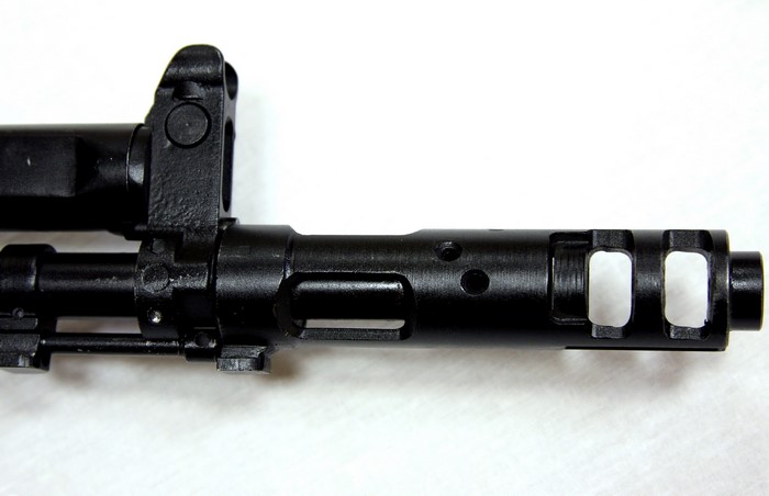 Close-up of an assault rifle muzzle brake