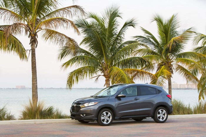 2016 Honda HR-V parked by the ocean with palm trees
